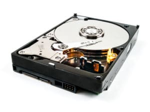 Computer hard drive with the protective casing removed Data Recovery and How You Can Protect Data Data Recovery and How You Can Protect Data hard drive recovery 9 300x225