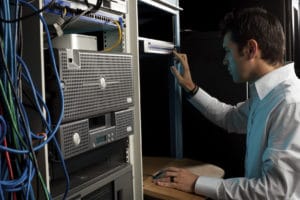An IT technician programming on a computer IT Maintenance Services – Why You Need to Have the Right IT Support IT Maintenance Services – Why You Need to Have the Right IT Support itmaintenance 300x200